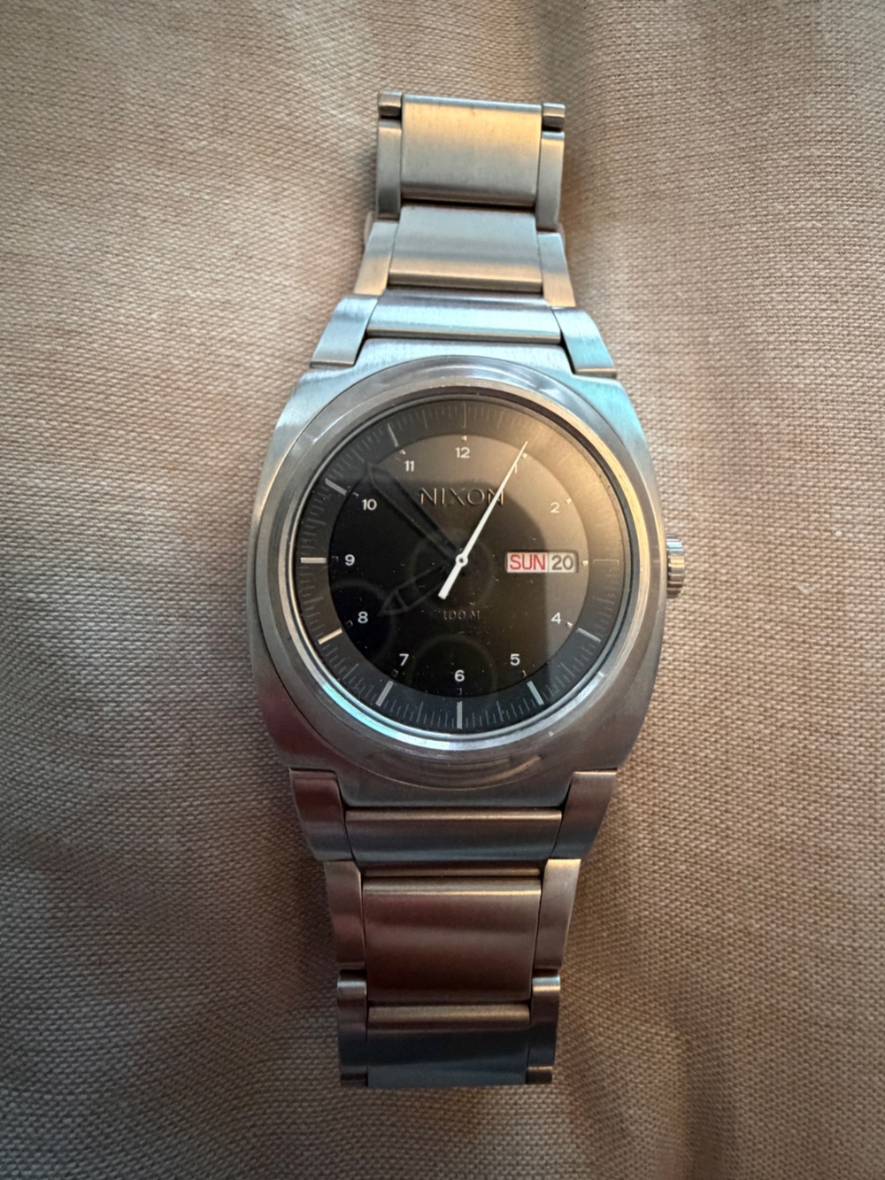 Nixon Stainless Steel Watch with Black Dial and Day Window